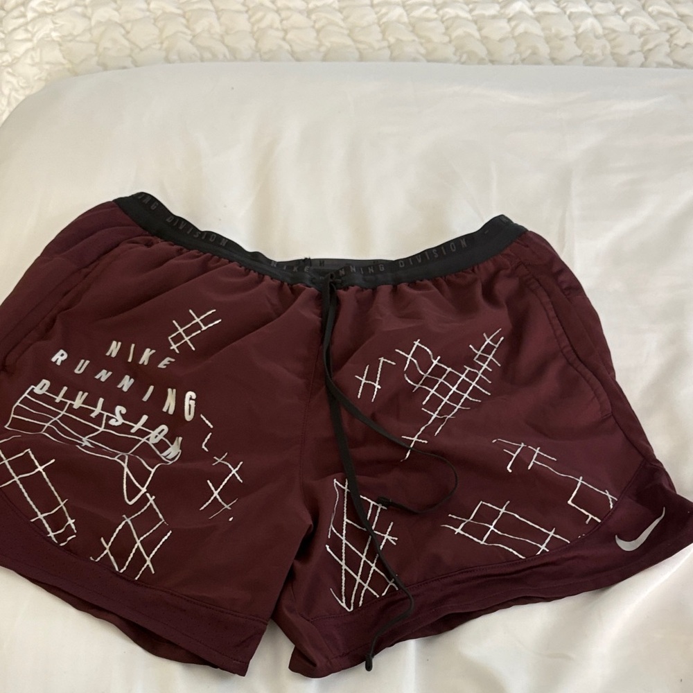 Nike Maroon Athletic Shorts with White Design